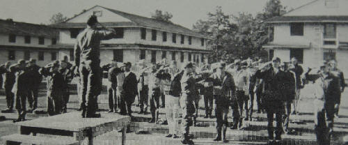 NCOs giving instructions to trainees on how to salute